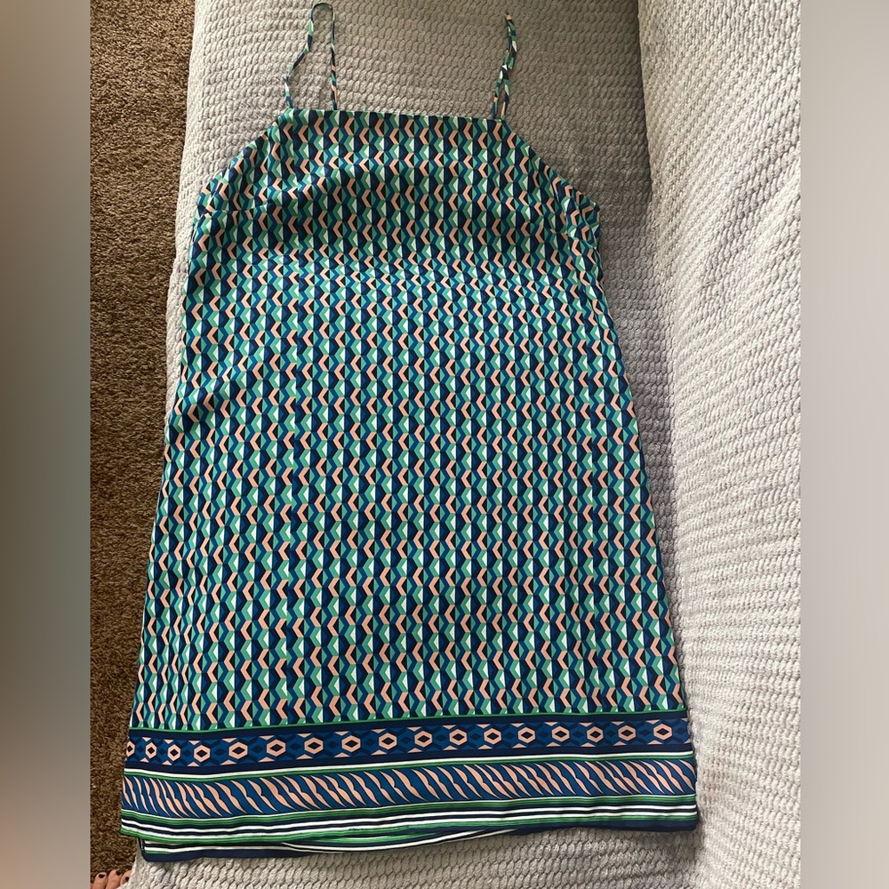 Cutest summery dress with its own cover up that simply flows beautifully.